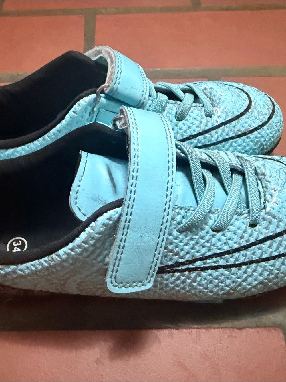 Kids Light Blue indoor soccer cleats with Hook-and-Loop Strap.